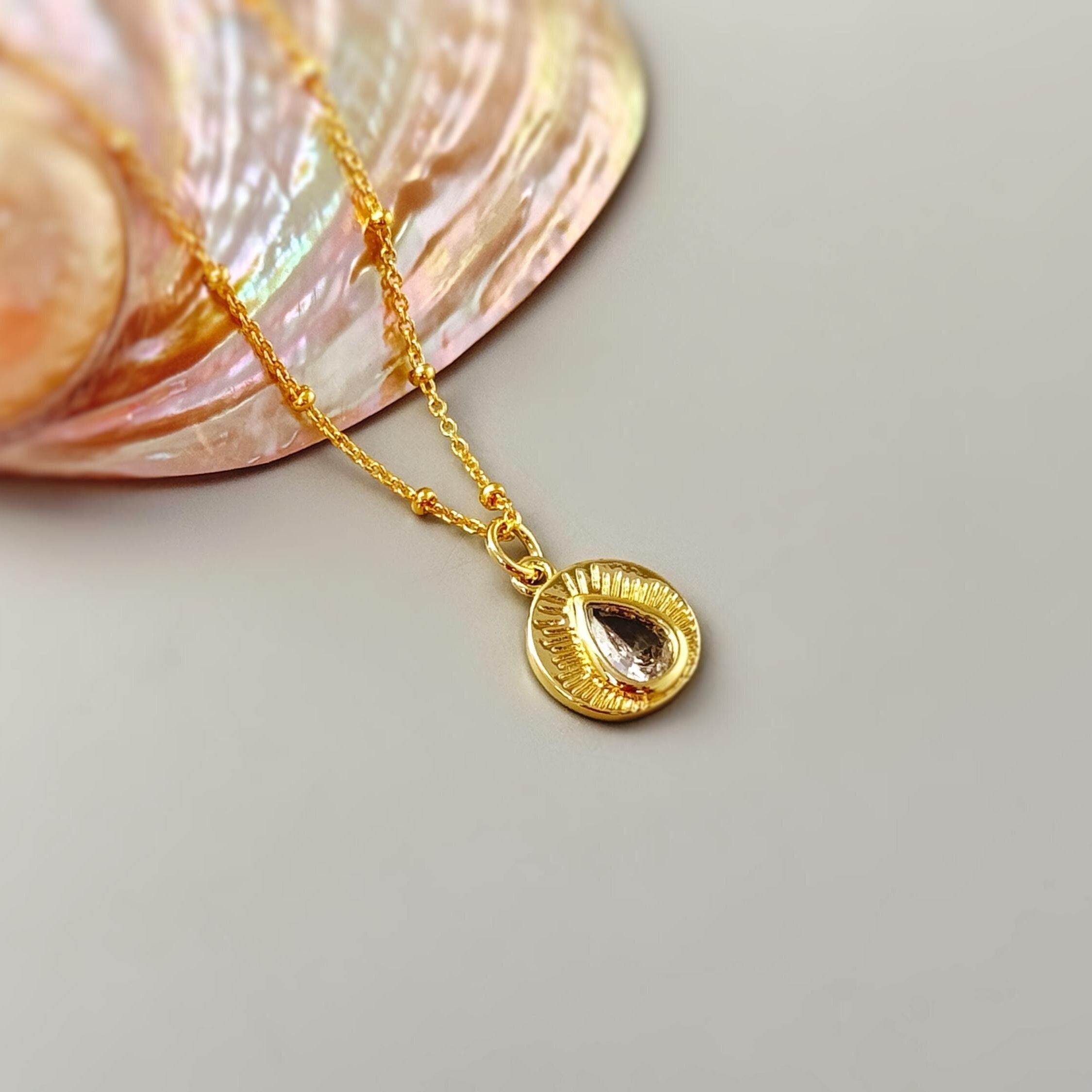 Gold Sunburst Crystal Necklace – Blue Heron1