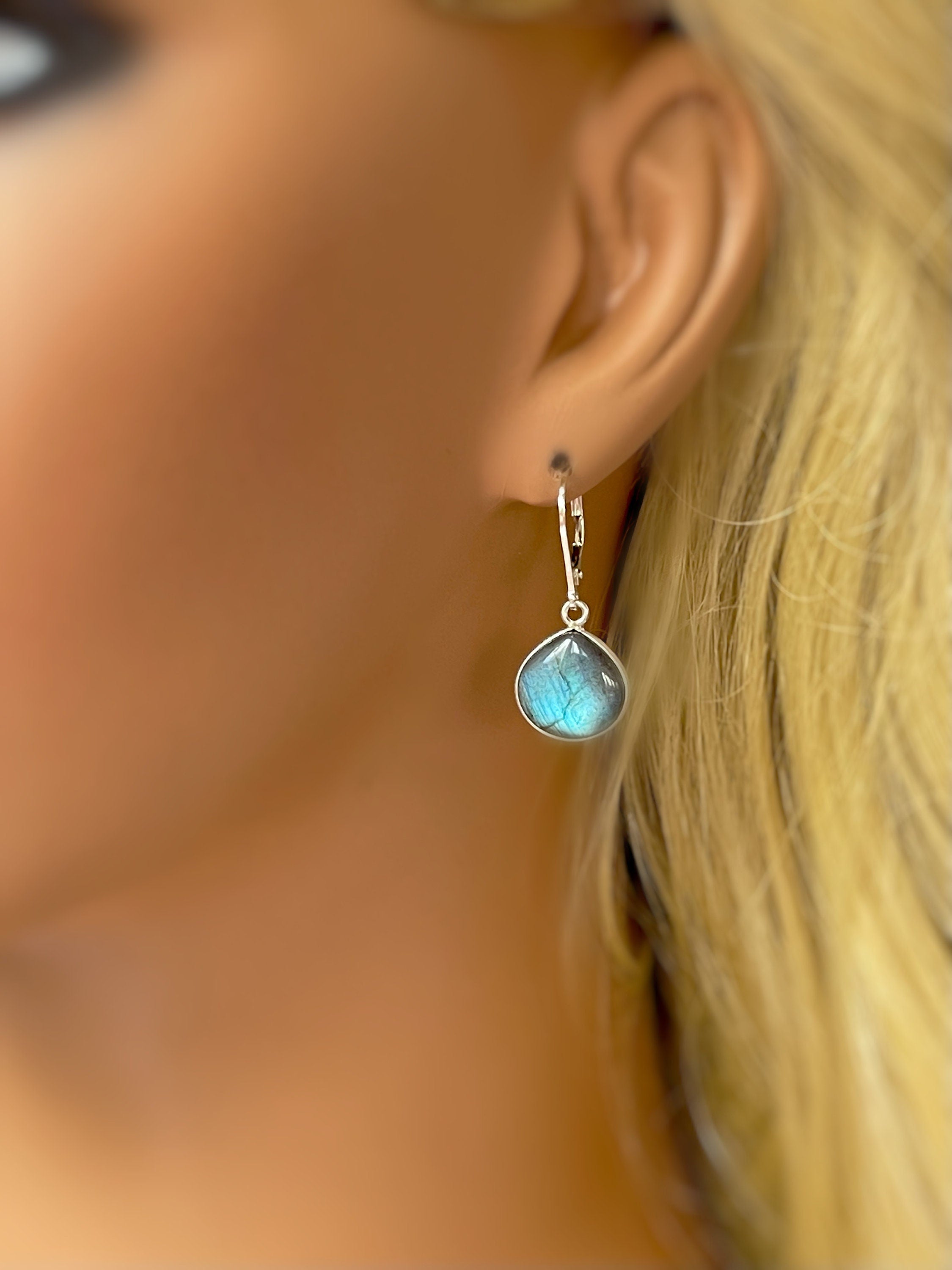 Handmade Labradorite Dangle Earrings minimalist gemstone drop earrings in sterling silver in model's ear for scale
