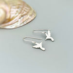 Handmade Hummingbird earrings dangle in silver of gold. These bird earrings are the perfect gift for moms, nature and bird lovers.