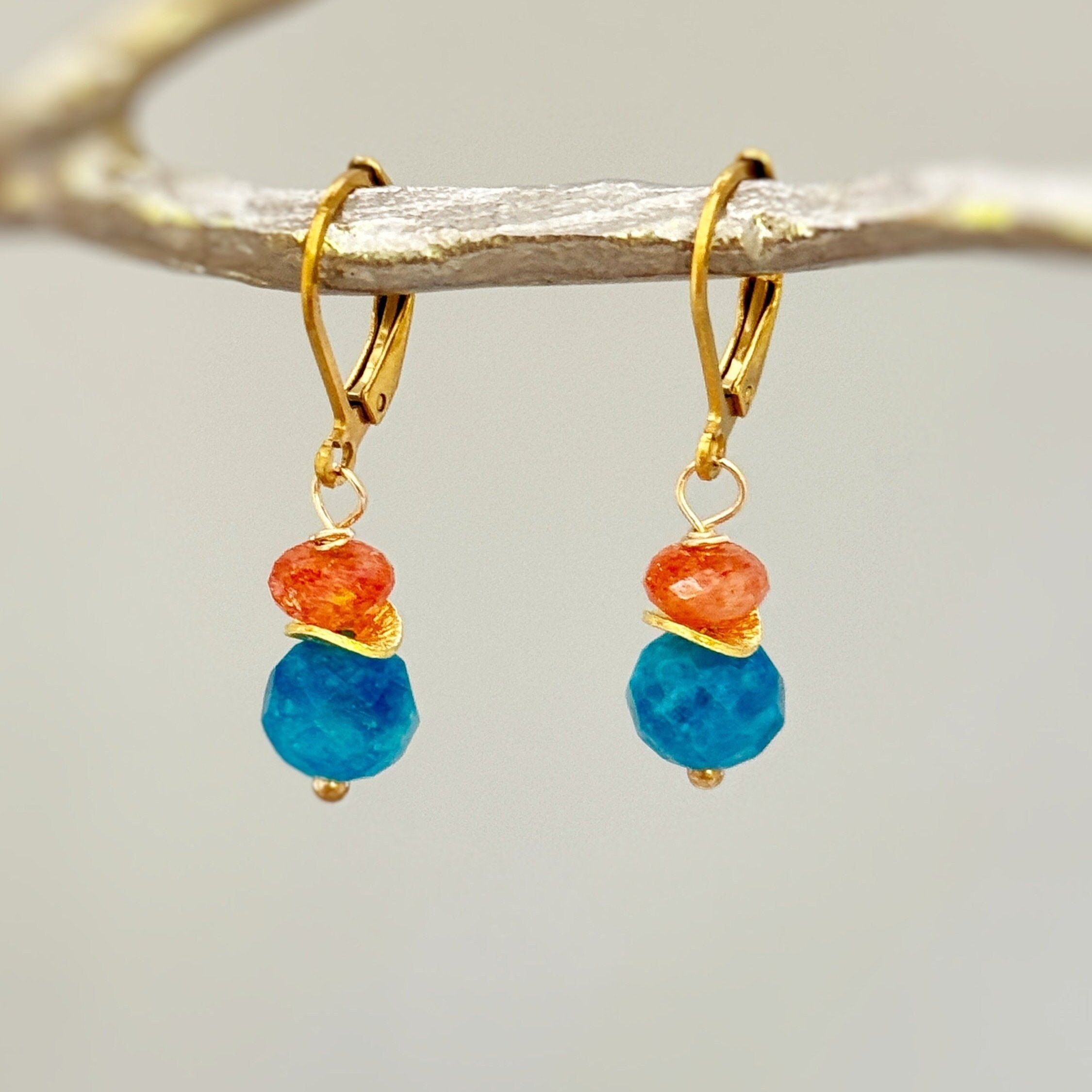 Colorful dangly drop orange sunstone and blue apatite dangle earrings in your choice of gold fill, rose gold fill, or sterling silver. A lovely gift for a mom, wife, or girlfriend. Handmade gemstone jewelry for women.