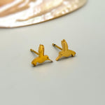 Tiny Hummingbird Earrings in gold, rose gold, and silver. Dainty second hold or cartilage earrings make a great gift for bird lovers, granddaughters, teenagers, and children.