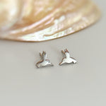 Tiny Hummingbird Earrings in silver, gold and rose gold. Dainty second hold or cartilage earrings make a great gift for bird lovers, granddaughters, teenagers, and children.