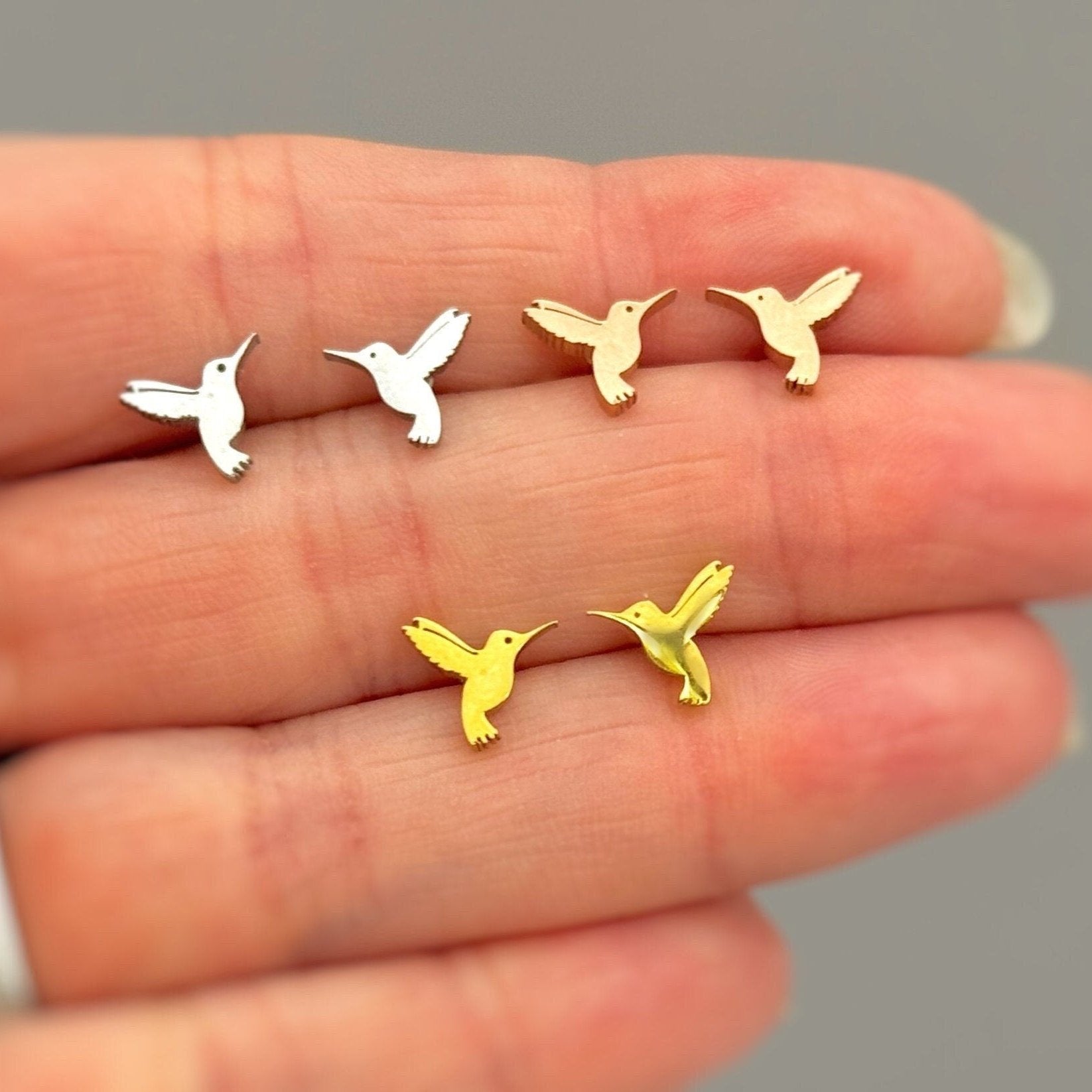 Tiny Hummingbird Earrings in silver, gold and rose gold fill. Dainty second hold or cartilage earrings make a great gift for bird lovers, granddaughters, teenagers, and children.