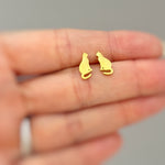 Tiny Cat Stud Earrings in gold, or silver. Dainty second hole cartilage earrings make a great gift for cat and animal lovers, moms, sisters, and friends.