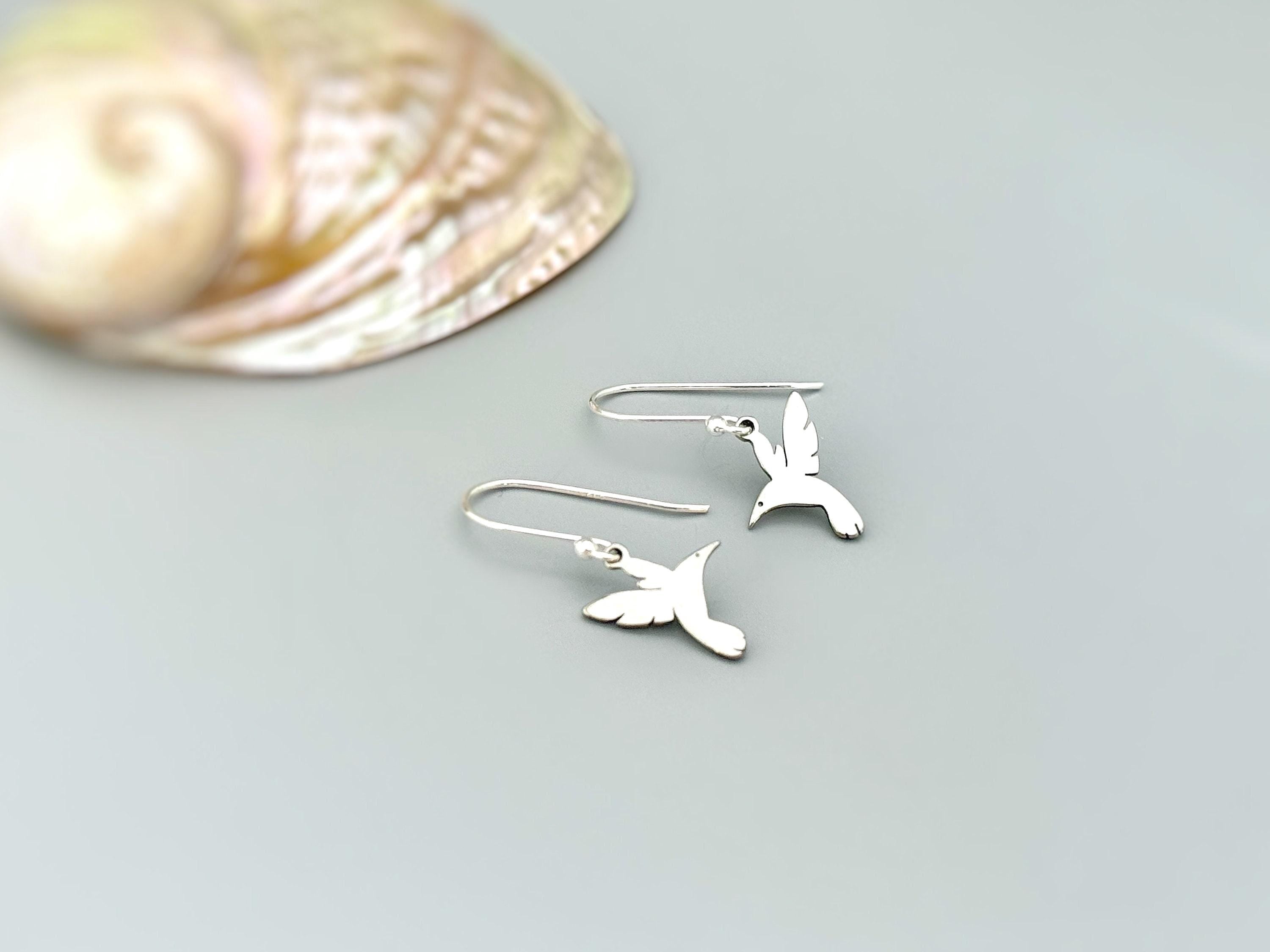 Handmade Hummingbird earrings dangle in silver of gold. These bird earrings are the perfect gift for moms, nature and bird lovers.