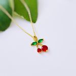 Dainty Gold Cherry Necklace cute red and green fruit jewelry food pendant for women unique, trendy charm pendant gift for foodie, chef, mom