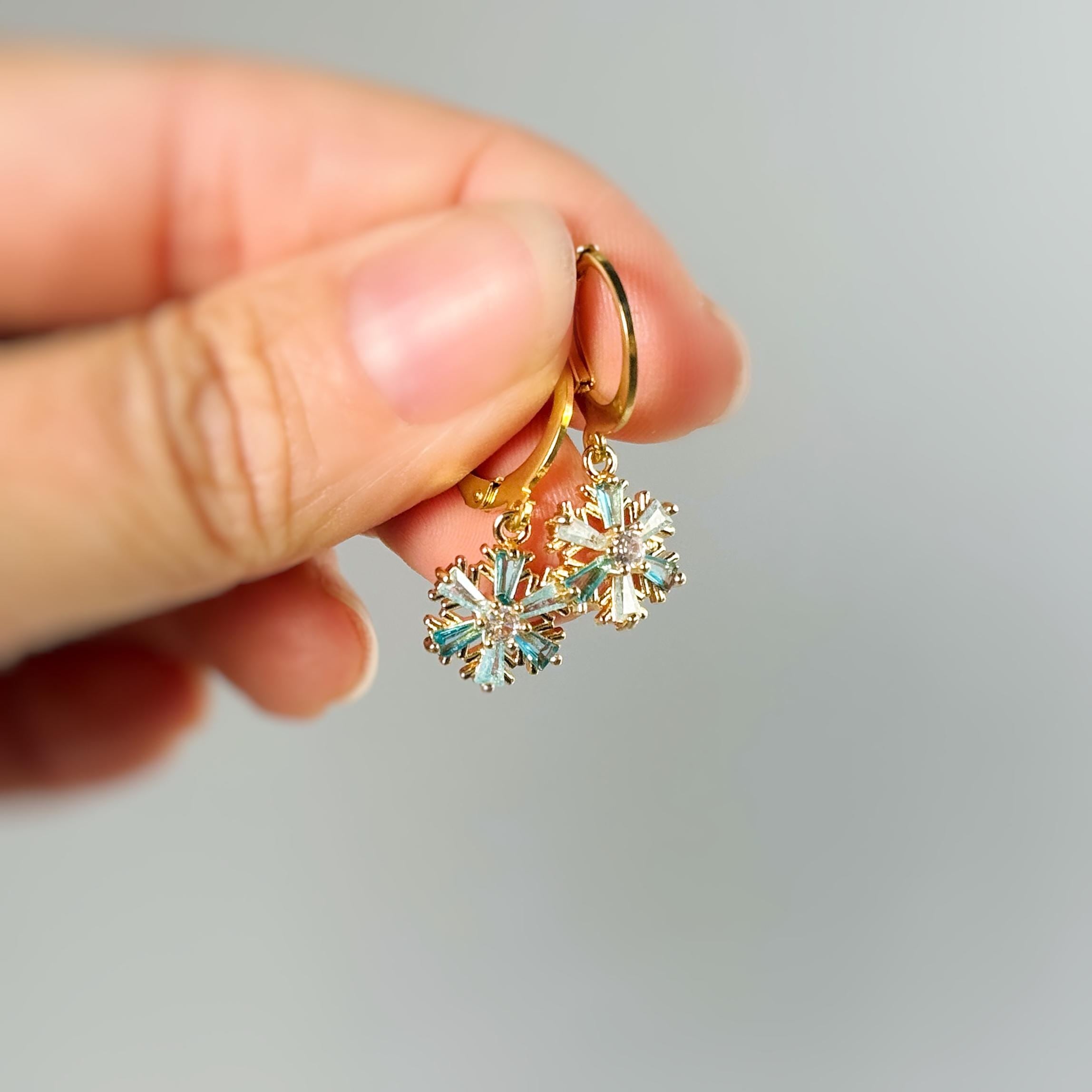 Elegant Gold Hoop Snowflake Earrings dangle handmade blue crystal winter Christmas jewelry for holiday parties festive sparkling earrings