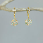 Elegant Gold Hoop Snowflake Earrings dangle handmade blue crystal winter Christmas jewelry for holiday parties festive sparkling earrings
