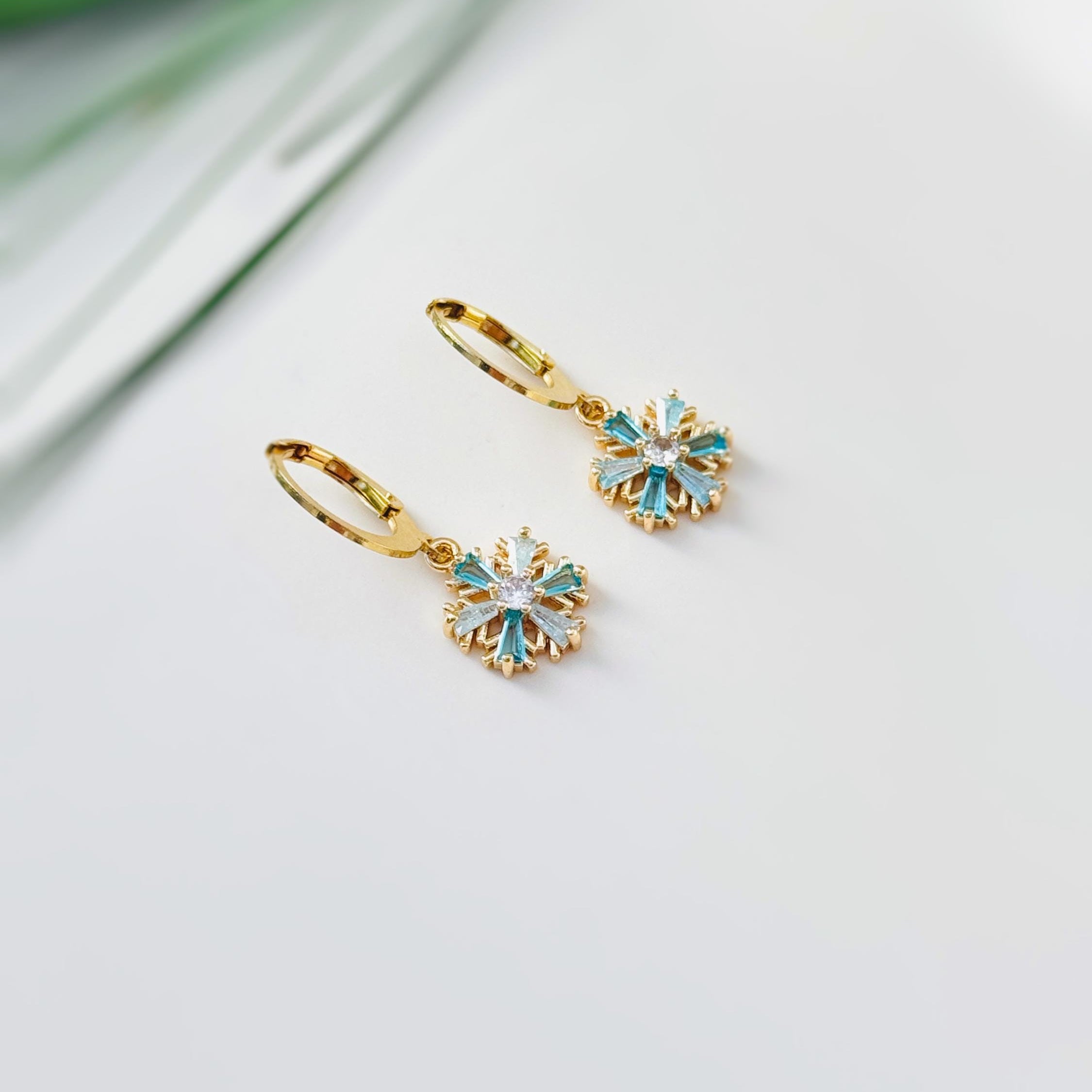 Elegant Gold Hoop Snowflake Earrings dangle handmade blue crystal winter Christmas jewelry for holiday parties festive sparkling earrings