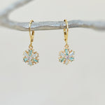 Elegant Gold Hoop Snowflake Earrings dangle handmade blue crystal winter Christmas jewelry for holiday parties festive sparkling earrings
