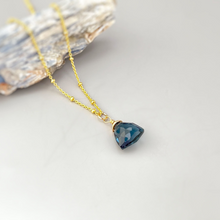 Load image into Gallery viewer, a necklace with a blue stone hanging from it