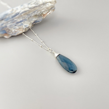 Load image into Gallery viewer, a necklace with a blue tear hanging from it
