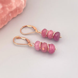 Dainty handmade genuine Pink Sapphire dangle earrings in blush pink Rose Gold Fill. Lightweight earrings for women. Facetted Pink Sapphire gemstone rondelles hang from your choice of Sterling Silver, 14k gold Fill, or Rose Gold Fill French hook ear wires or leverbacks